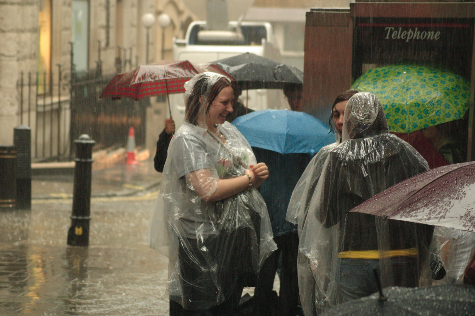 People queueing up for the Harry Potter book launch in London, you can see how heavy the rain was now!