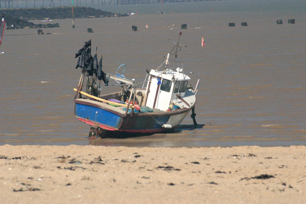 Fishing boat moored on the beach at Clacton-on-Sea.