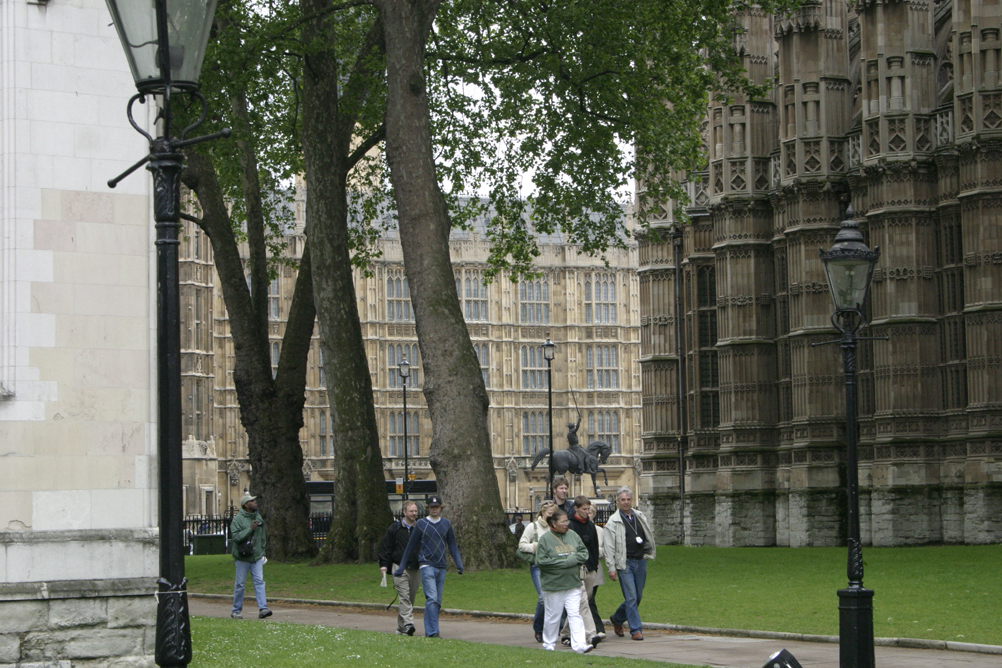 Houses of Parliament as seen from the grounds of Westminster Abbey and St Margarets church.